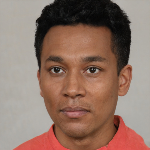 Neutral black young-adult male with short  black hair and brown eyes