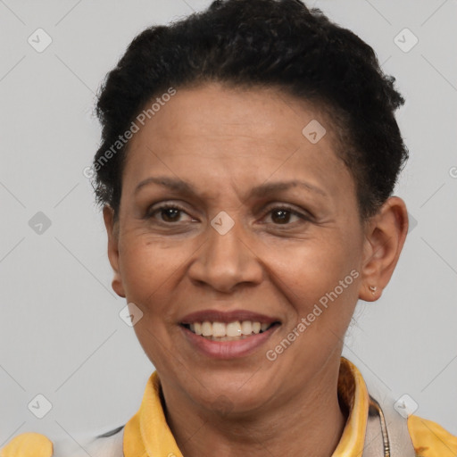 Joyful latino adult female with short  brown hair and brown eyes