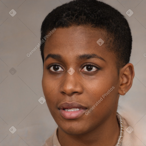 Joyful black young-adult female with short  brown hair and brown eyes