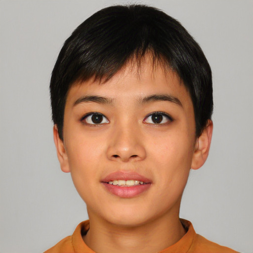 Joyful asian young-adult female with short  black hair and brown eyes