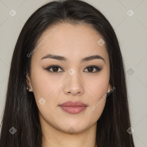 Joyful latino young-adult female with long  brown hair and brown eyes