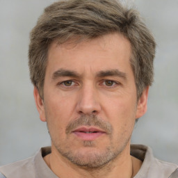 Neutral white adult male with short  brown hair and brown eyes