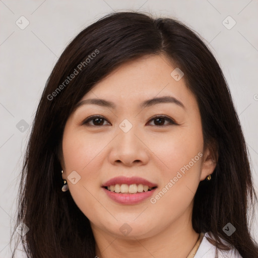 Joyful white young-adult female with long  brown hair and brown eyes