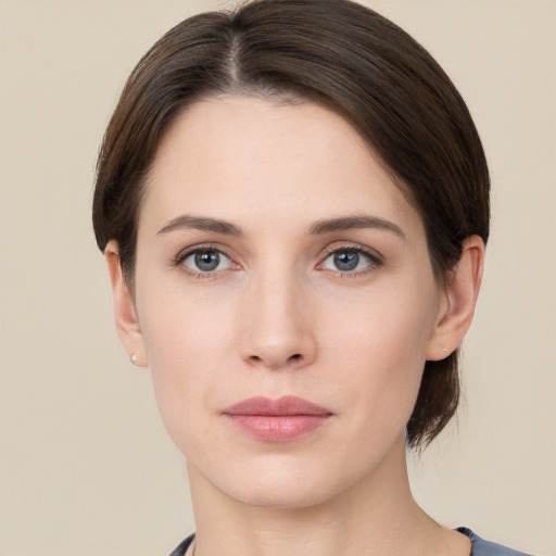 Neutral white young-adult female with short  brown hair and brown eyes