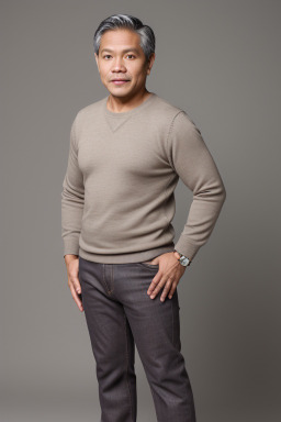 Filipino middle-aged male with  gray hair