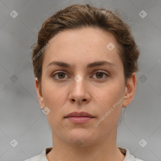 Neutral white young-adult female with short  brown hair and brown eyes