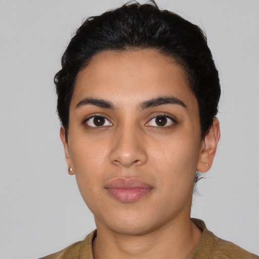 Neutral latino young-adult female with short  black hair and brown eyes