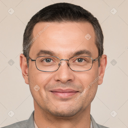 Joyful white adult male with short  brown hair and brown eyes