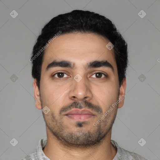 Neutral latino young-adult male with short  black hair and brown eyes