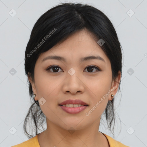 Joyful asian young-adult female with medium  black hair and brown eyes