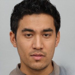 Neutral asian young-adult male with short  brown hair and brown eyes