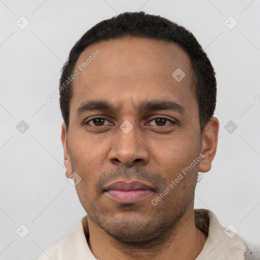 Neutral latino adult male with short  black hair and brown eyes