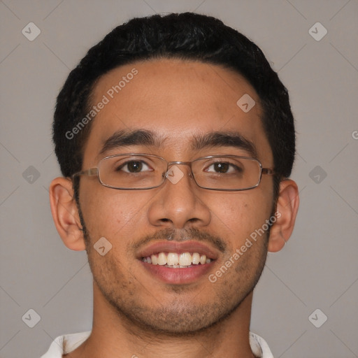 Joyful latino young-adult male with short  black hair and brown eyes