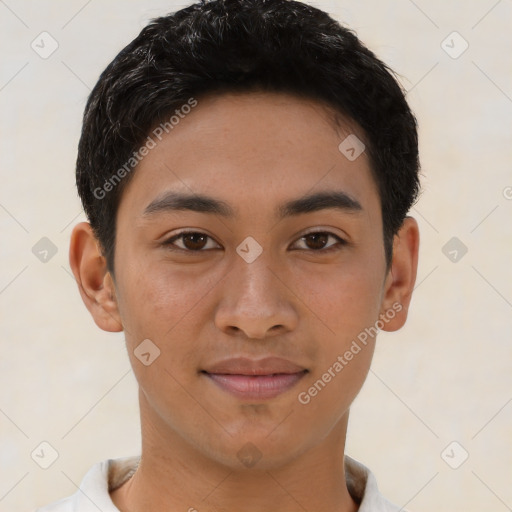 Joyful latino young-adult male with short  brown hair and brown eyes