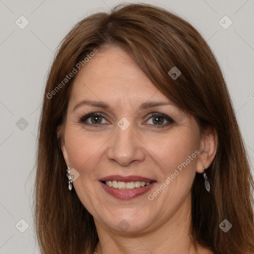 Joyful white adult female with long  brown hair and brown eyes