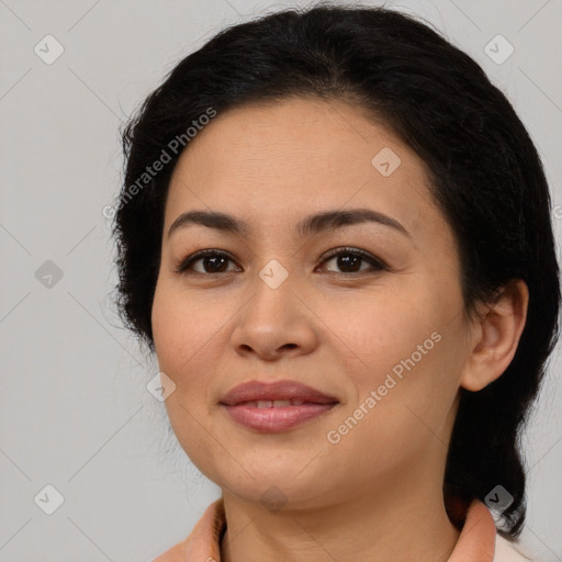 Joyful latino young-adult female with medium  brown hair and brown eyes