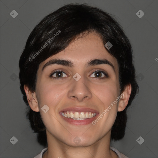 Joyful white young-adult female with medium  brown hair and brown eyes