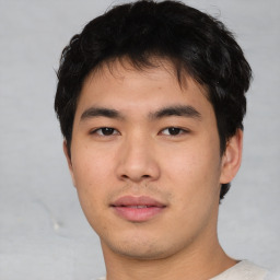 Neutral asian young-adult male with short  brown hair and brown eyes