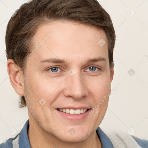 Joyful white adult male with short  brown hair and grey eyes