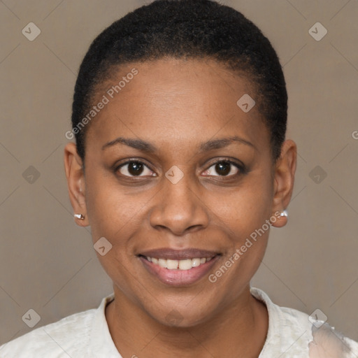 Joyful black young-adult female with short  black hair and brown eyes