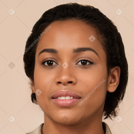 Joyful latino young-adult female with long  brown hair and brown eyes