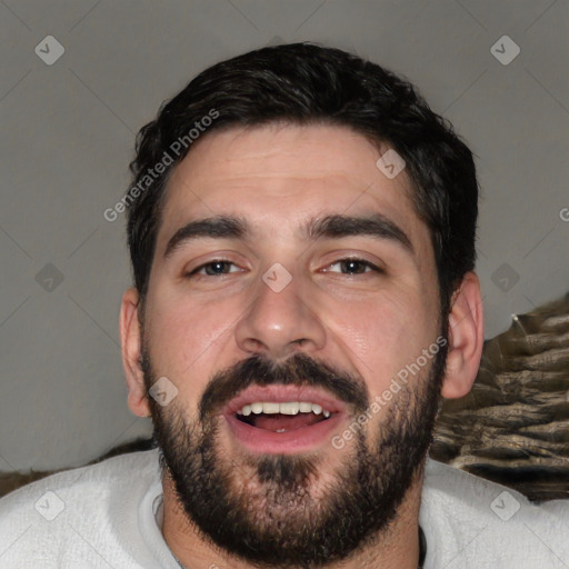 Joyful white young-adult male with short  black hair and brown eyes