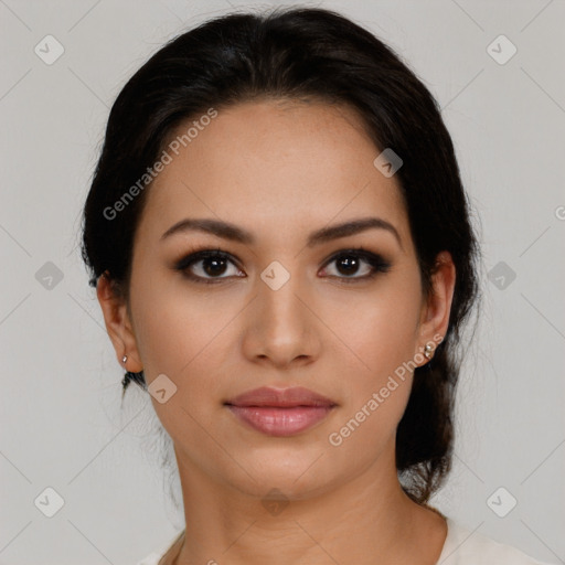 Joyful latino young-adult female with medium  brown hair and brown eyes