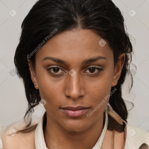 Joyful black young-adult female with medium  brown hair and brown eyes