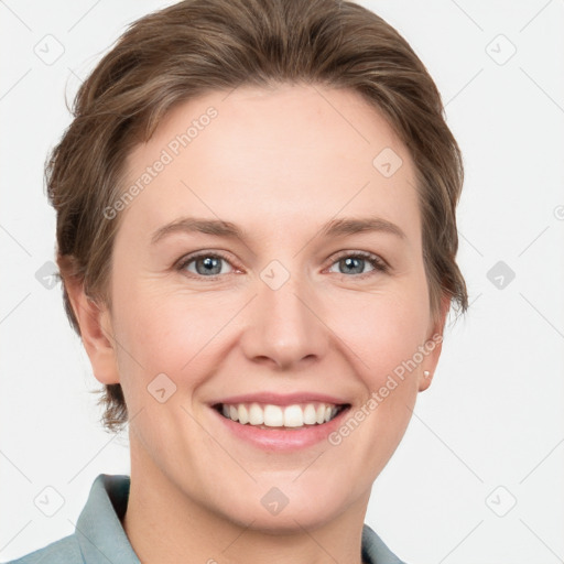 Joyful white young-adult female with short  brown hair and grey eyes