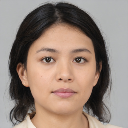 Neutral asian young-adult female with medium  brown hair and brown eyes
