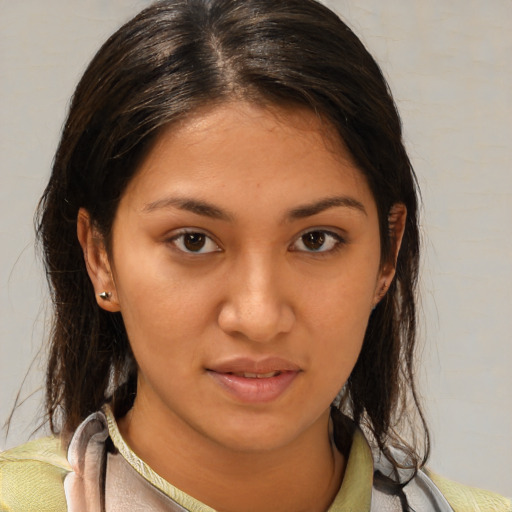 Joyful white young-adult female with medium  brown hair and brown eyes