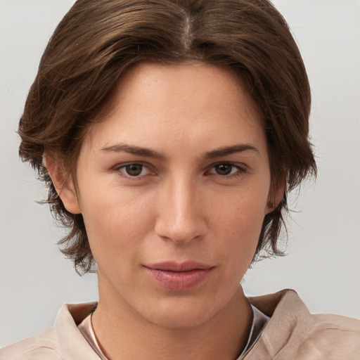 Neutral white young-adult female with medium  brown hair and brown eyes