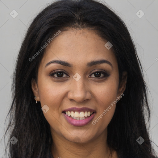 Joyful latino young-adult female with long  brown hair and brown eyes