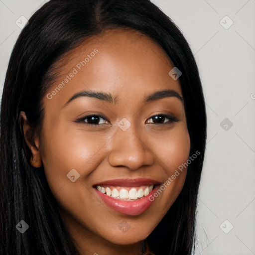 Joyful latino young-adult female with long  brown hair and brown eyes