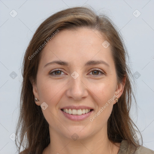 Joyful white young-adult female with long  brown hair and grey eyes