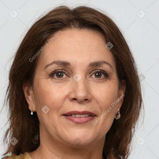 Joyful white adult female with medium  brown hair and brown eyes