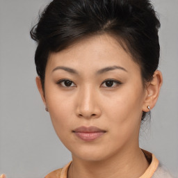 Neutral asian young-adult female with short  brown hair and brown eyes