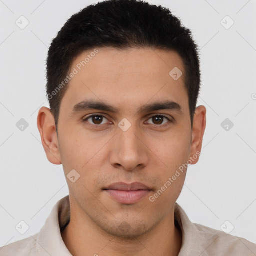 Joyful latino young-adult male with short  brown hair and brown eyes