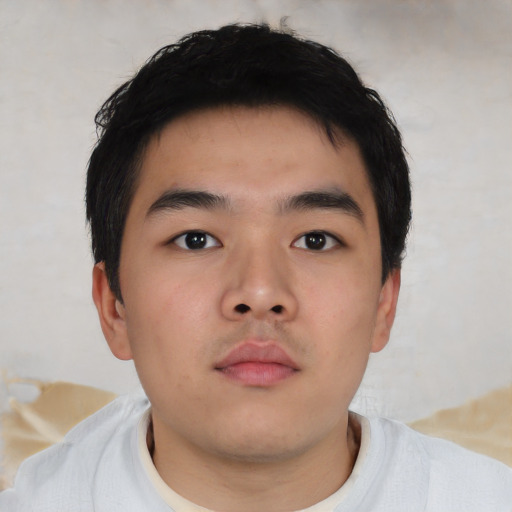 Neutral asian child male with short  black hair and brown eyes
