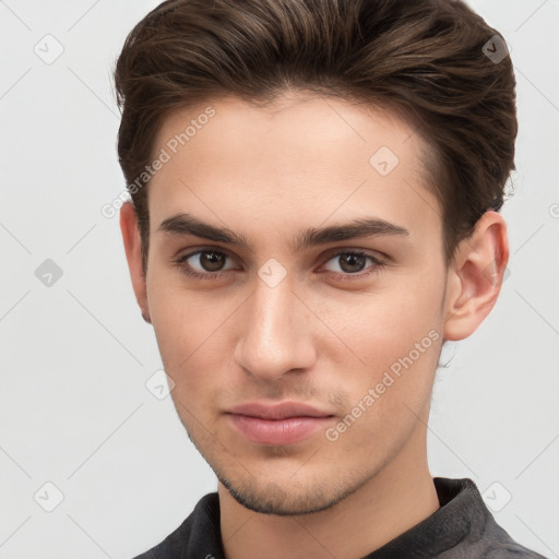 Neutral white young-adult male with short  brown hair and brown eyes