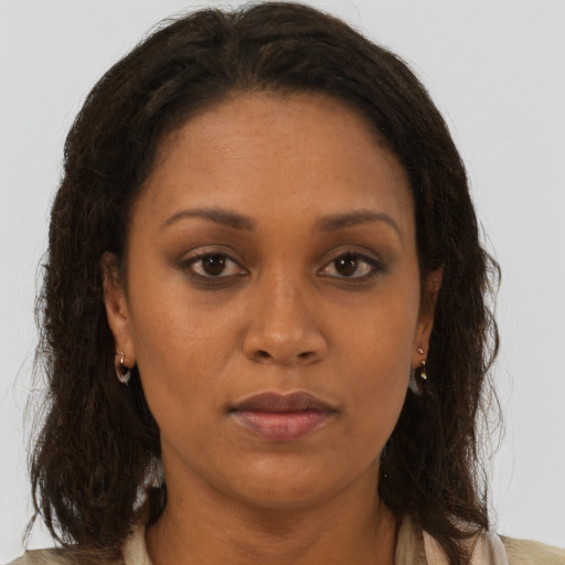 Neutral black adult female with long  brown hair and brown eyes