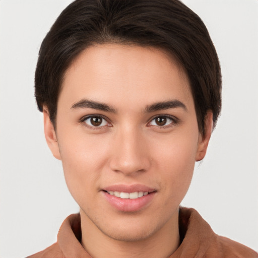 Joyful white young-adult female with short  brown hair and brown eyes