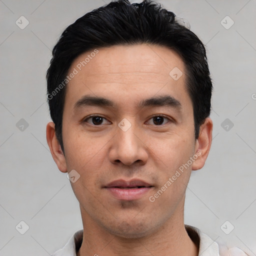 Joyful white young-adult male with short  black hair and brown eyes