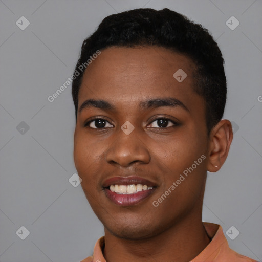 Joyful black young-adult male with short  black hair and brown eyes