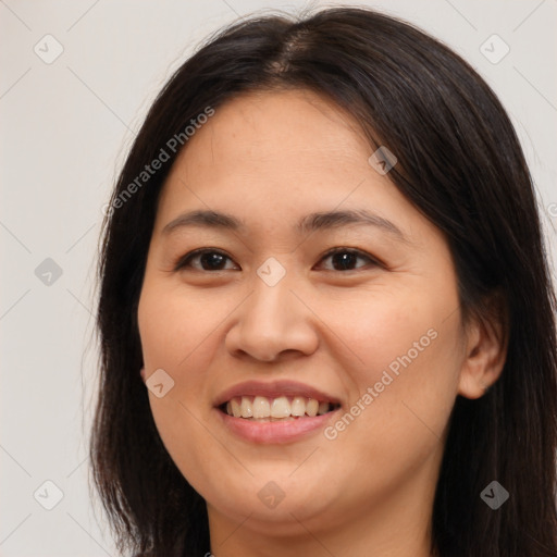 Joyful white young-adult female with long  brown hair and brown eyes