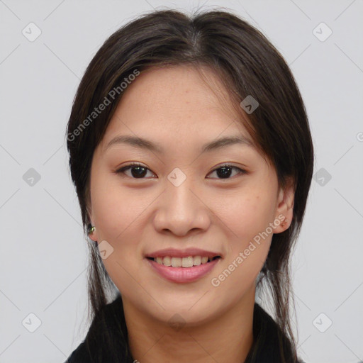 Joyful asian young-adult female with medium  brown hair and brown eyes