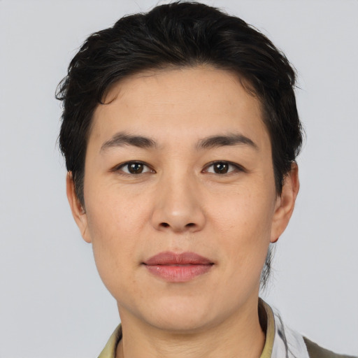 Joyful white young-adult female with short  black hair and brown eyes