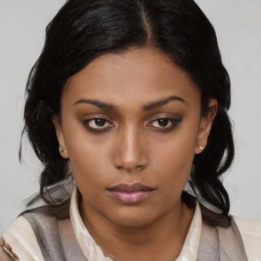 Neutral latino young-adult female with long  black hair and brown eyes