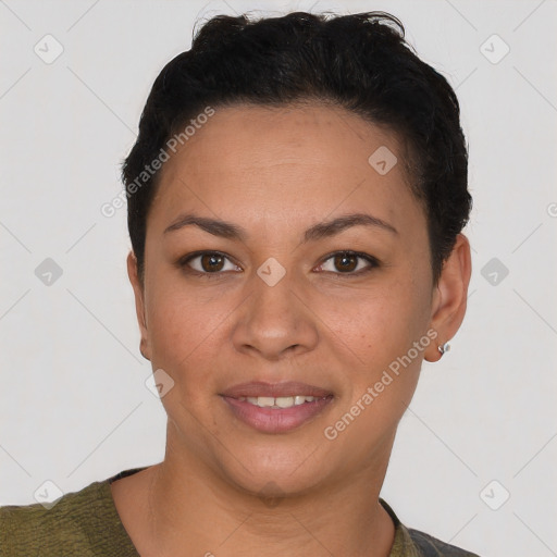 Joyful latino young-adult female with short  brown hair and brown eyes