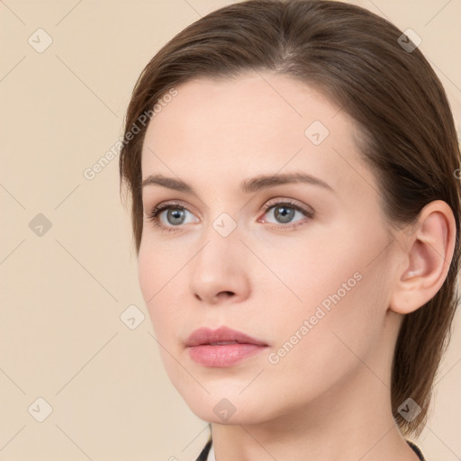 Neutral white young-adult female with long  brown hair and grey eyes